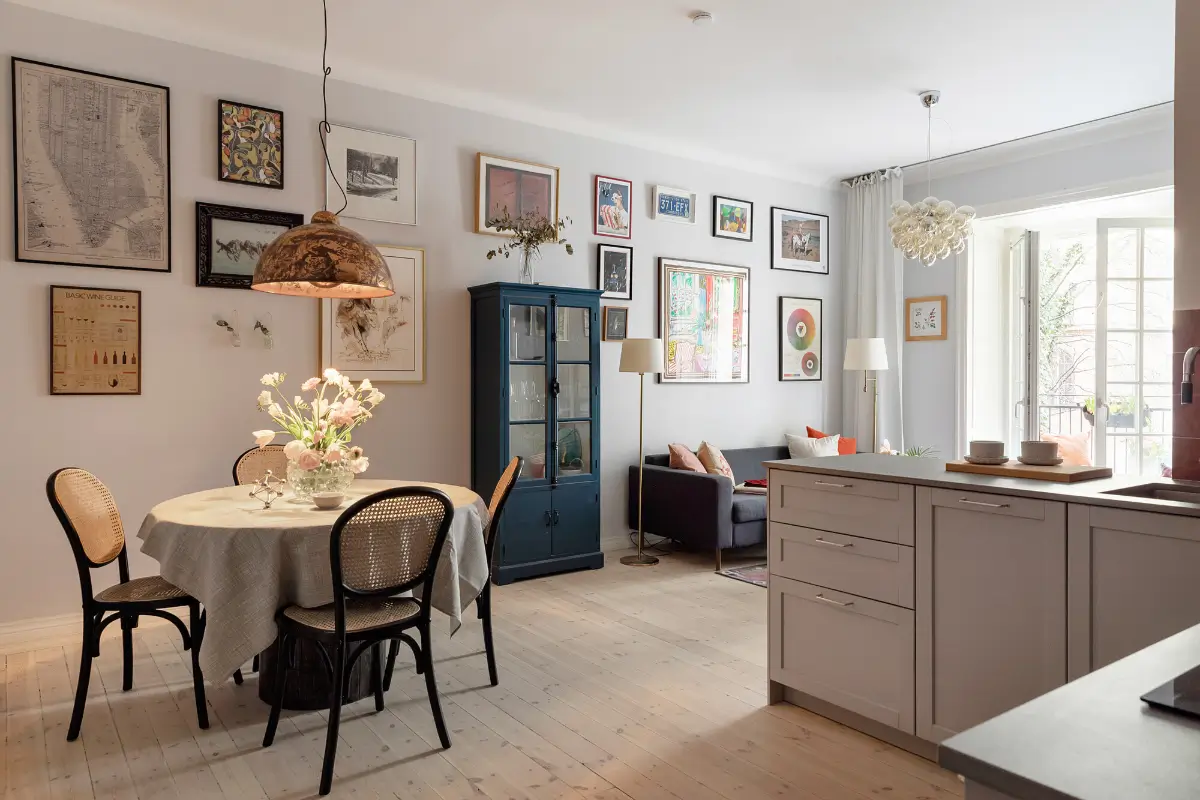 Red and Blue Color Accents in an Open-Plan Stockholm Apartment 1 open plan living space light gray walls light wooden floor nordroom
