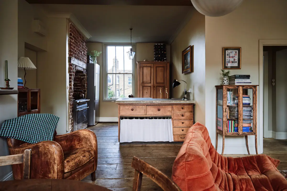 Restored Features in a Charming Georgian Apartment in London 6 open-plan living space rustic floorboards