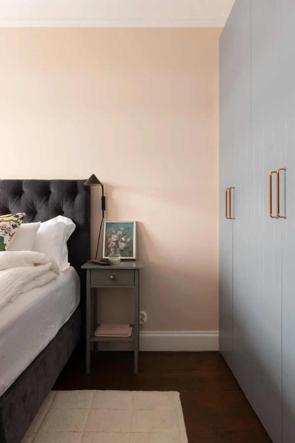 A Warm Color Palette in a Cozy 1920s Apartment in Stockholm 20 pink bedroom gray wardrobes