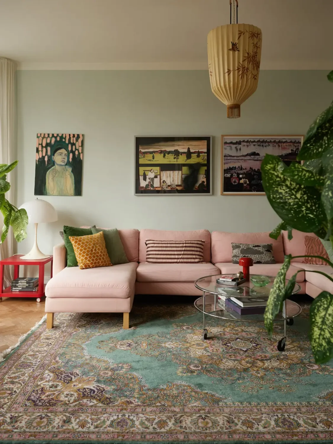 A Spacious Family Apartment with Original Details in Stockholm 3 pink sofa