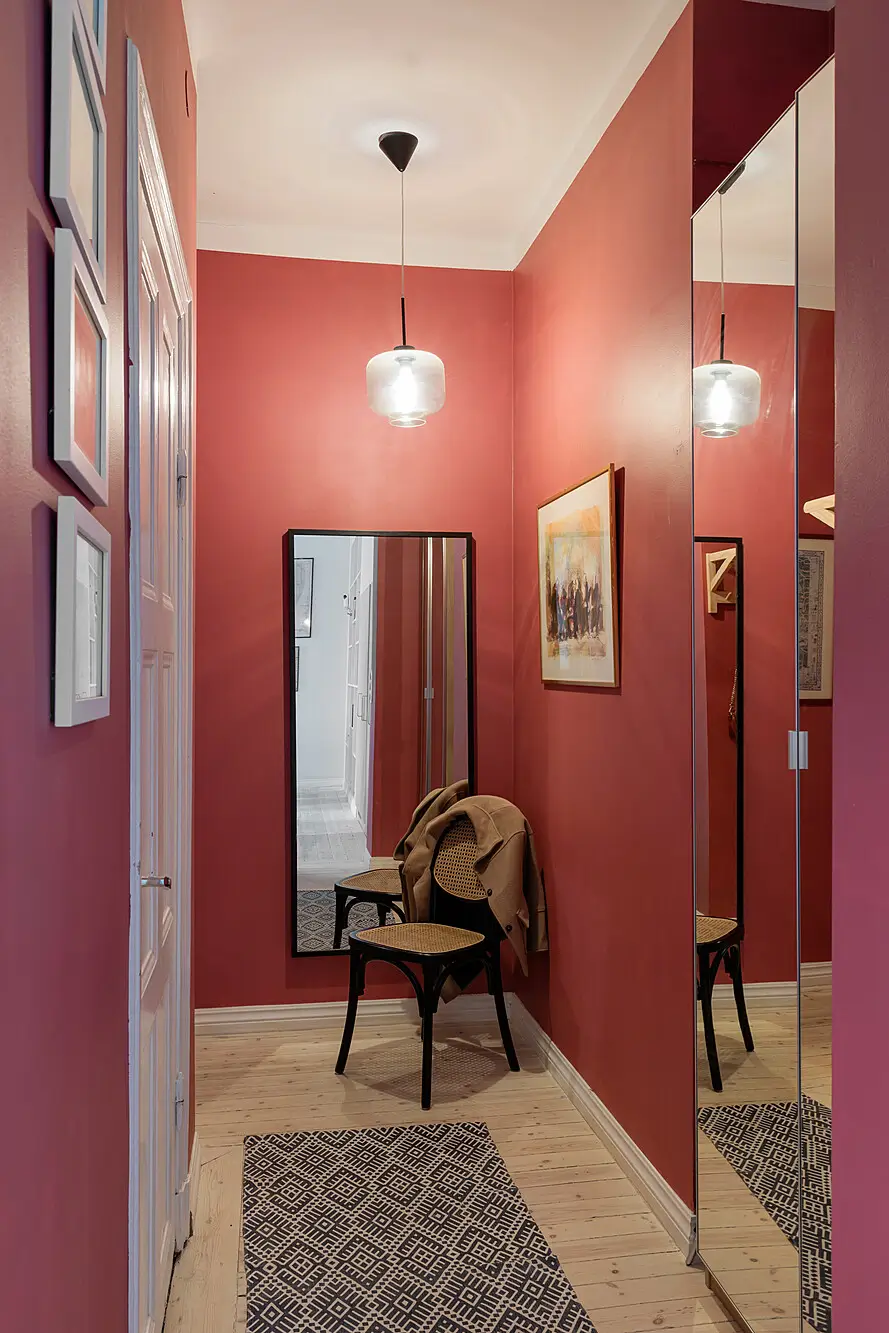 Red and Blue Color Accents in an Open-Plan Stockholm Apartment 20 red-hall-mirror-nordroom