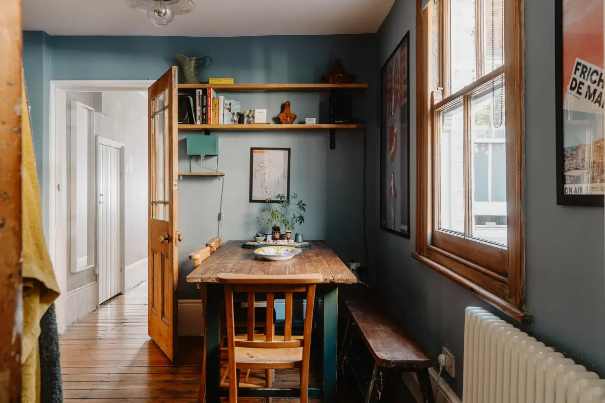 Shades of Blue and Original Details in a Victorian Garden Apartment 6 rustic dining table