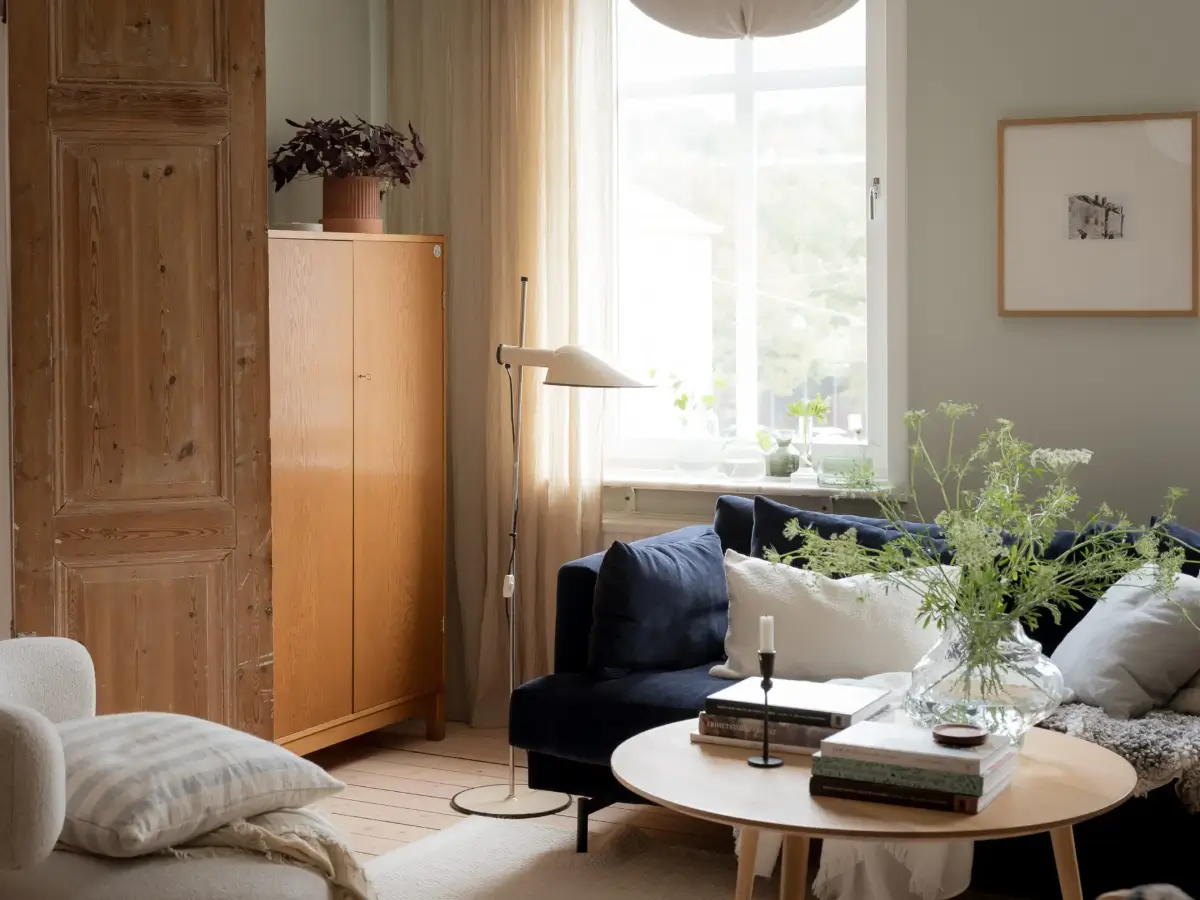 A Cozy Apartment with Exposed Brick and Period Details 2 scandinavian living room