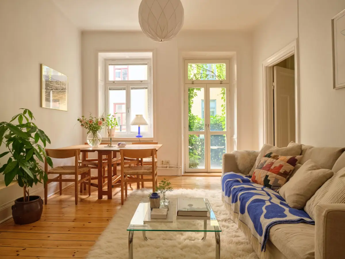 serene living room wooden floorboards large table