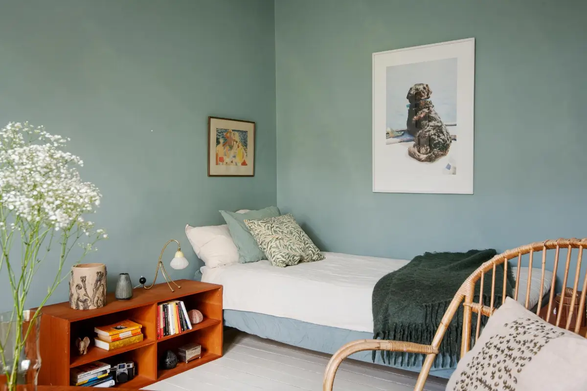 Historic Character and Color in a Swedish Studio Apartment 10 studio open wooden cabinet bedside table