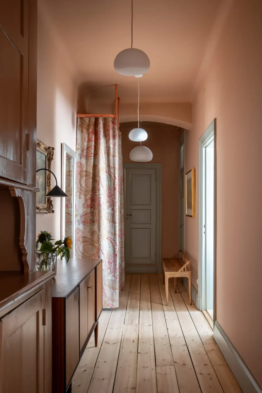 Historic Elegance and a French-Style Kitchen and Bathroom in a Stockholm Apartment 35 terracotta colored hall wooden floorboards nordroom