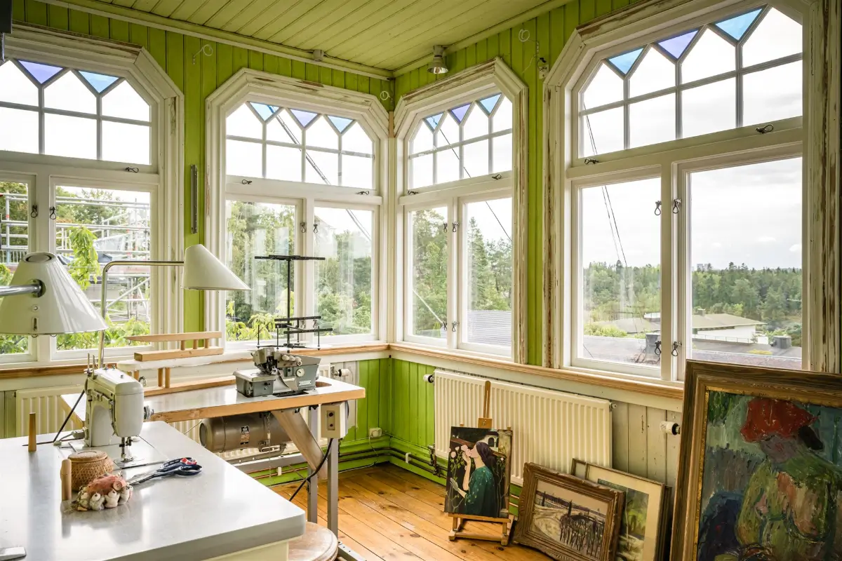 A Cozy Early 20th-Century Home with Views of Lake Mälaren in Sweden 29 veranda green paneling