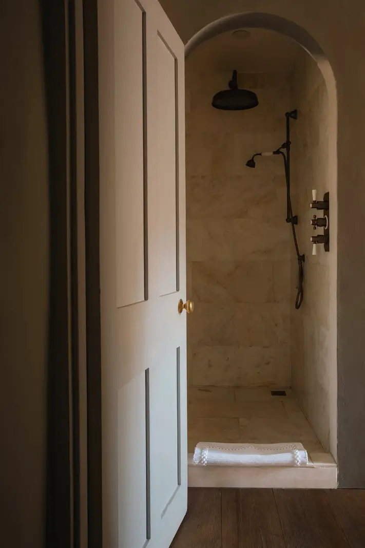 Lime Paint and Cozy Rooms in a Charming English Cottage 26 arched doorway shower