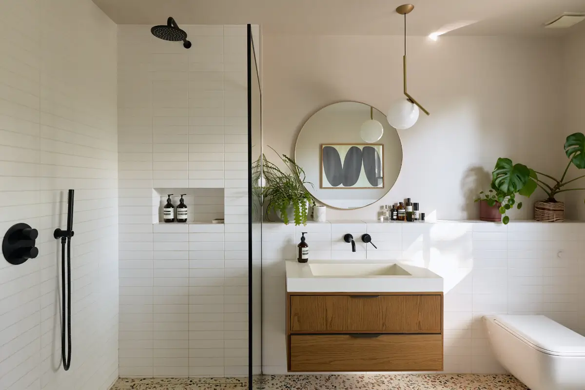 A Beautiful Victorian Townhouse Reimagined for Modern Living 32 bathroom walk-in shower white and terrazzo tiles
