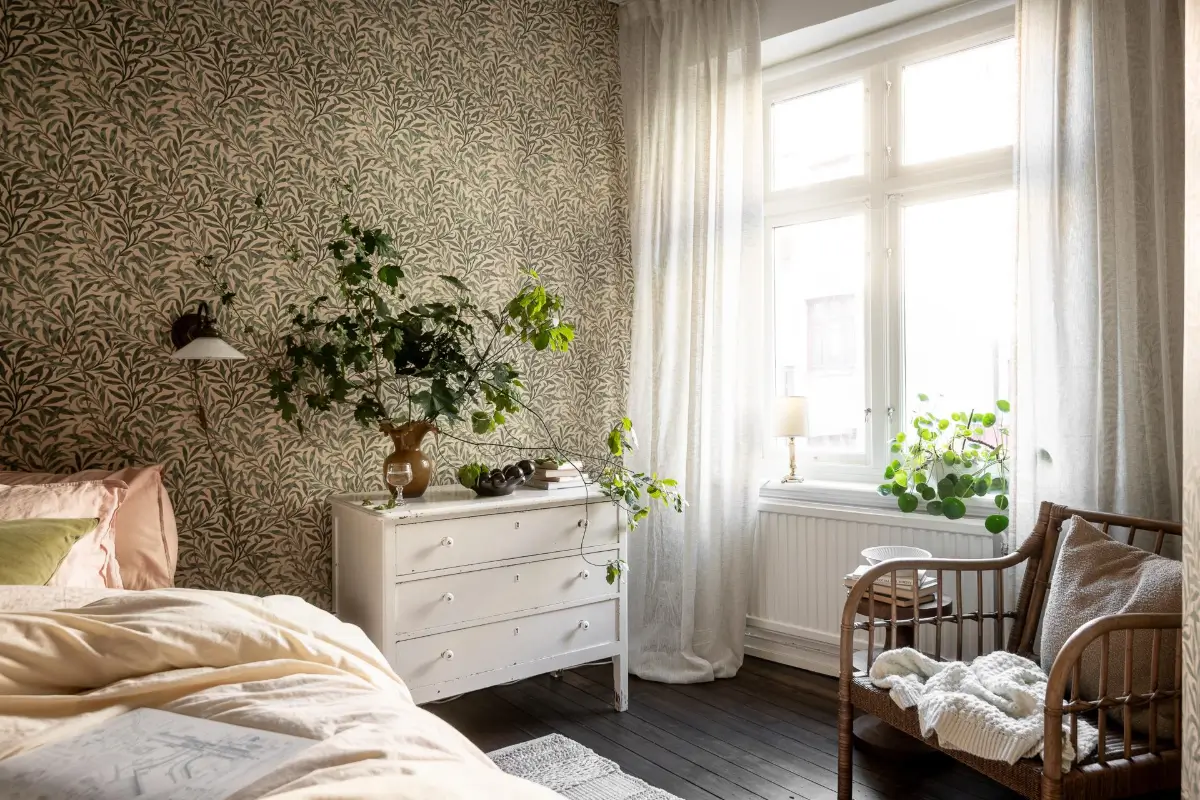 William Morris Wallpapers and Period Features in a Gothenburg Apartment 24 bedroom black wooden floorboards william morris wallpaper