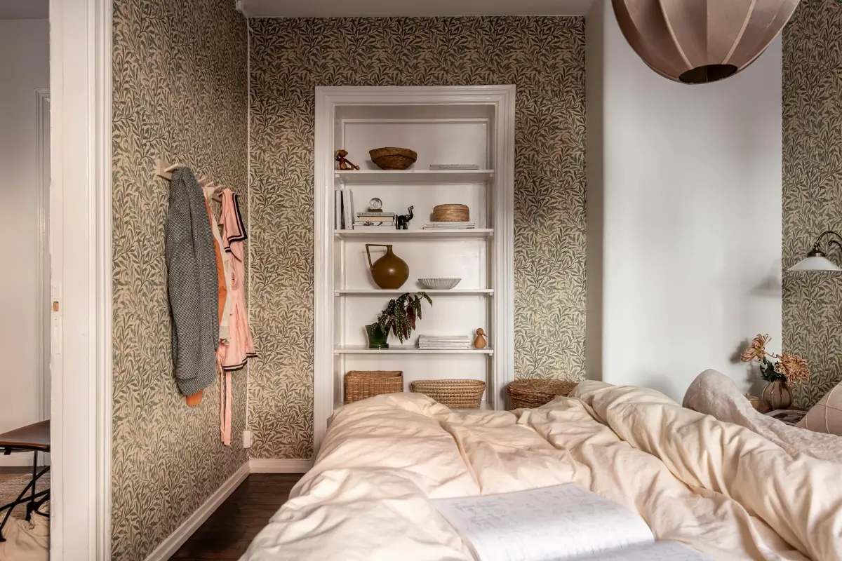 William Morris Wallpapers and Period Features in a Gothenburg Apartment 25 bedroom built-in bookshelves