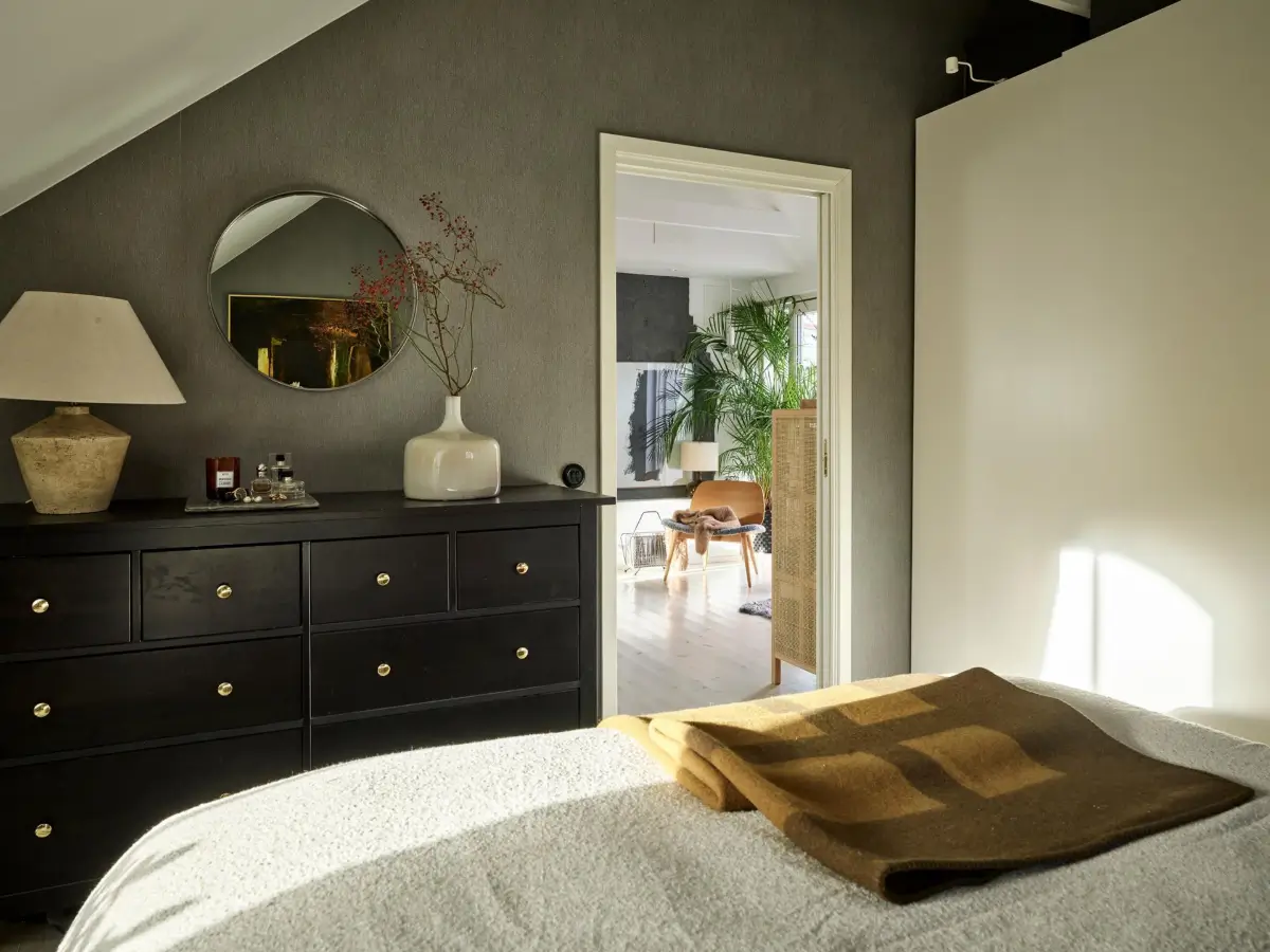 Gray Tones and High Ceilings in a Cozy Swedish Duplex Apartment 17 bedroom dark gray wallpaper