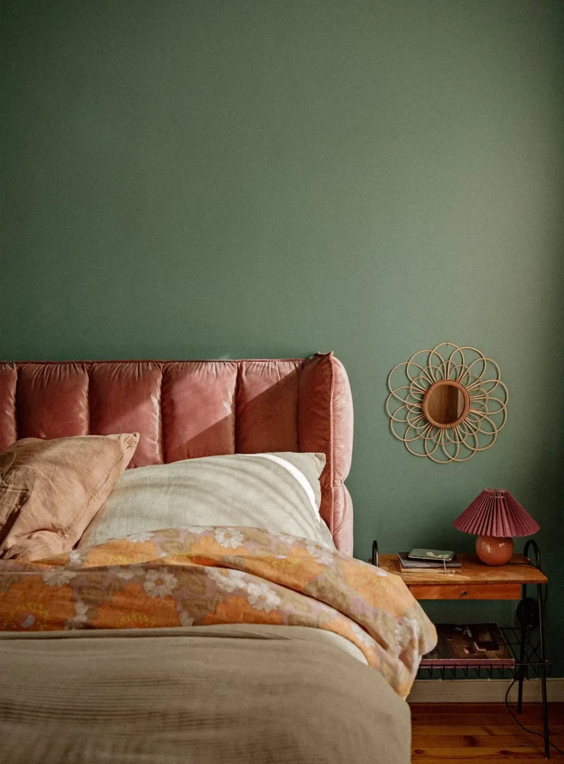 Green Tones and Period Elements in a 1940s Apartment 12 bedroom detail pink bedframe