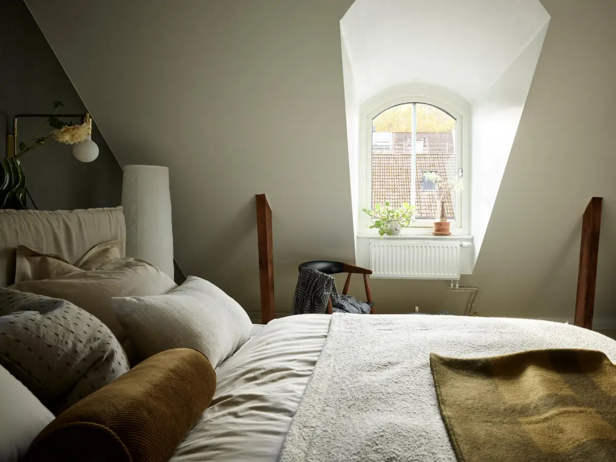 Gray Tones and High Ceilings in a Cozy Swedish Duplex Apartment 16 bedroom dormer window