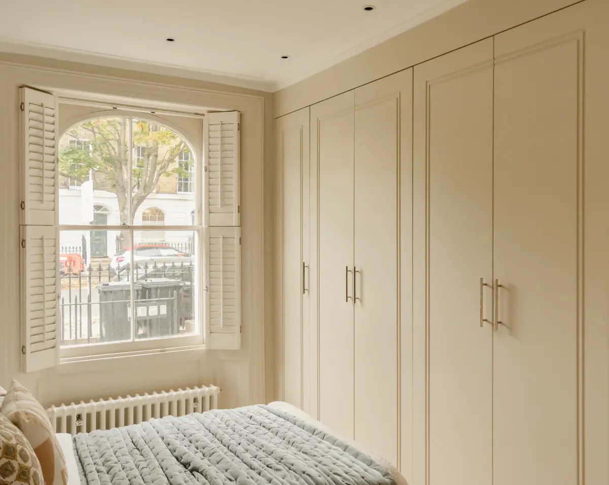 A Serene Duplex Apartment with a Glass Extension in London 22 bedroom with built-in wardrobes