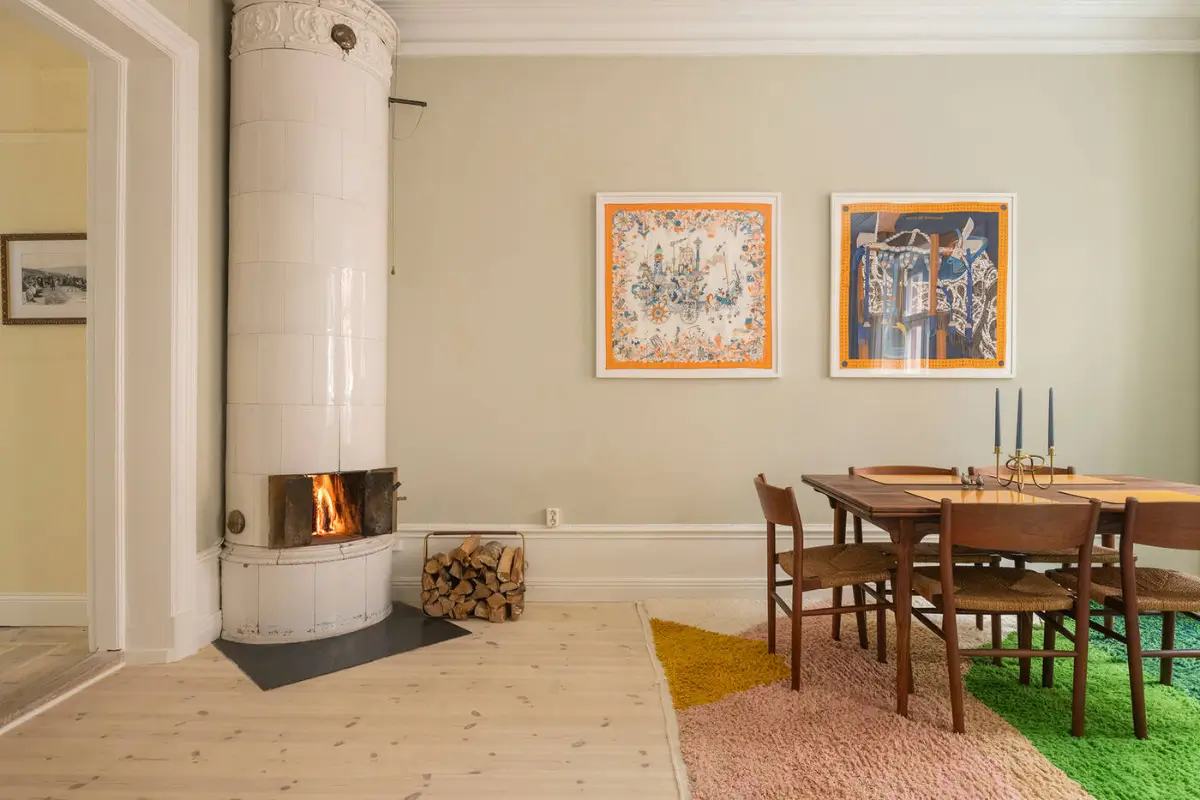 A Stylish Beige Apartment with a Light Blue Kitchen 6 beige living room multi-colored rug fireplace