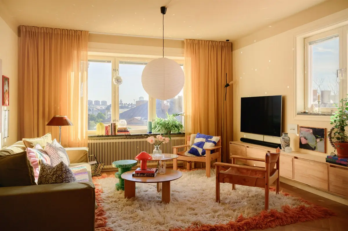 A Colorful Stockholm Family Apartment with Views of the Lake 2 beige-yellow walls scandinavian living room