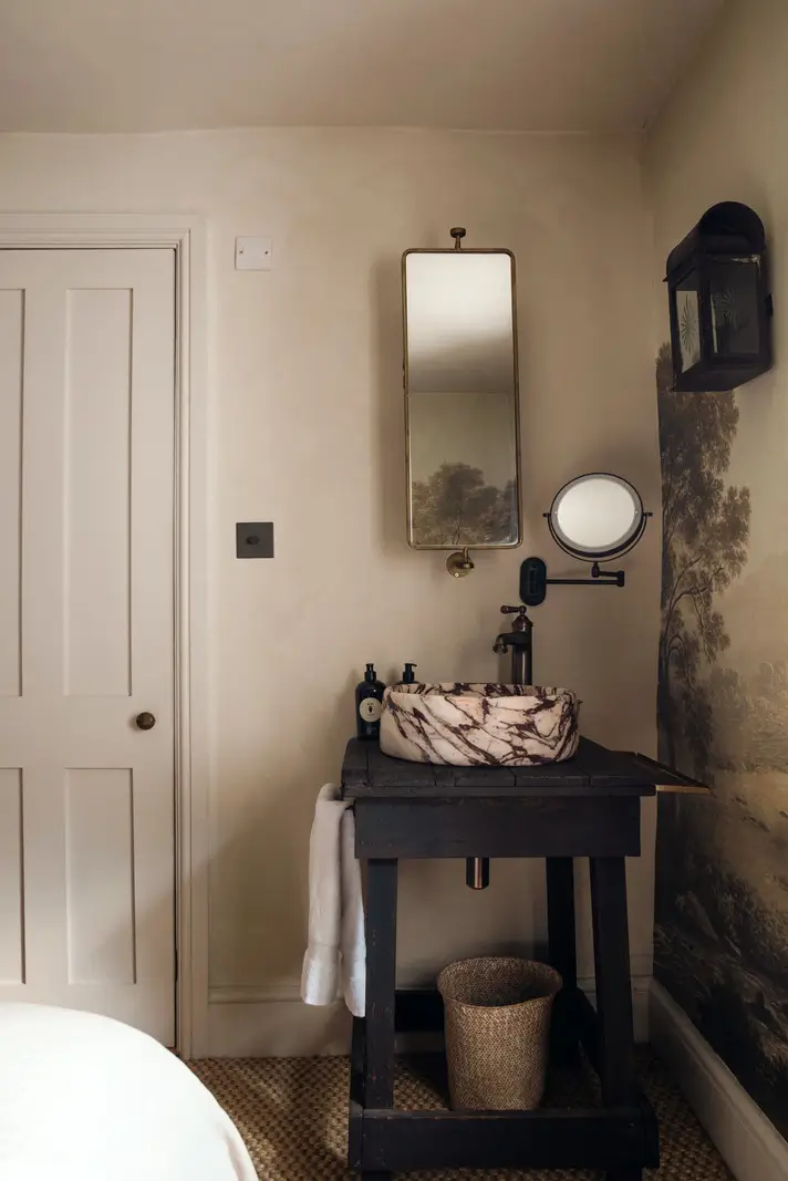 Lime Paint and Cozy Rooms in a Charming English Cottage 16 cottage bedroom round marble sink nordroom