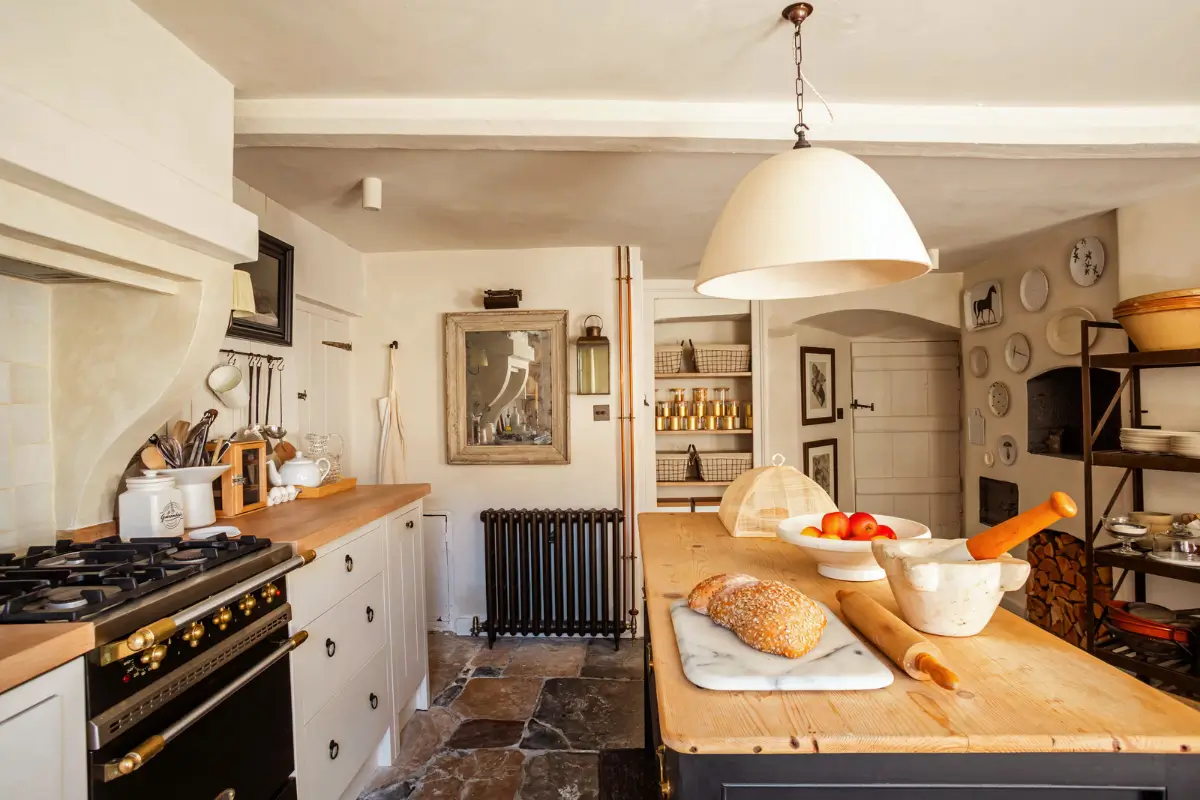 Lime Paint and Cozy Rooms in a Charming English Cottage 2 cottage-kitchen-island-stone-floor-nordroom