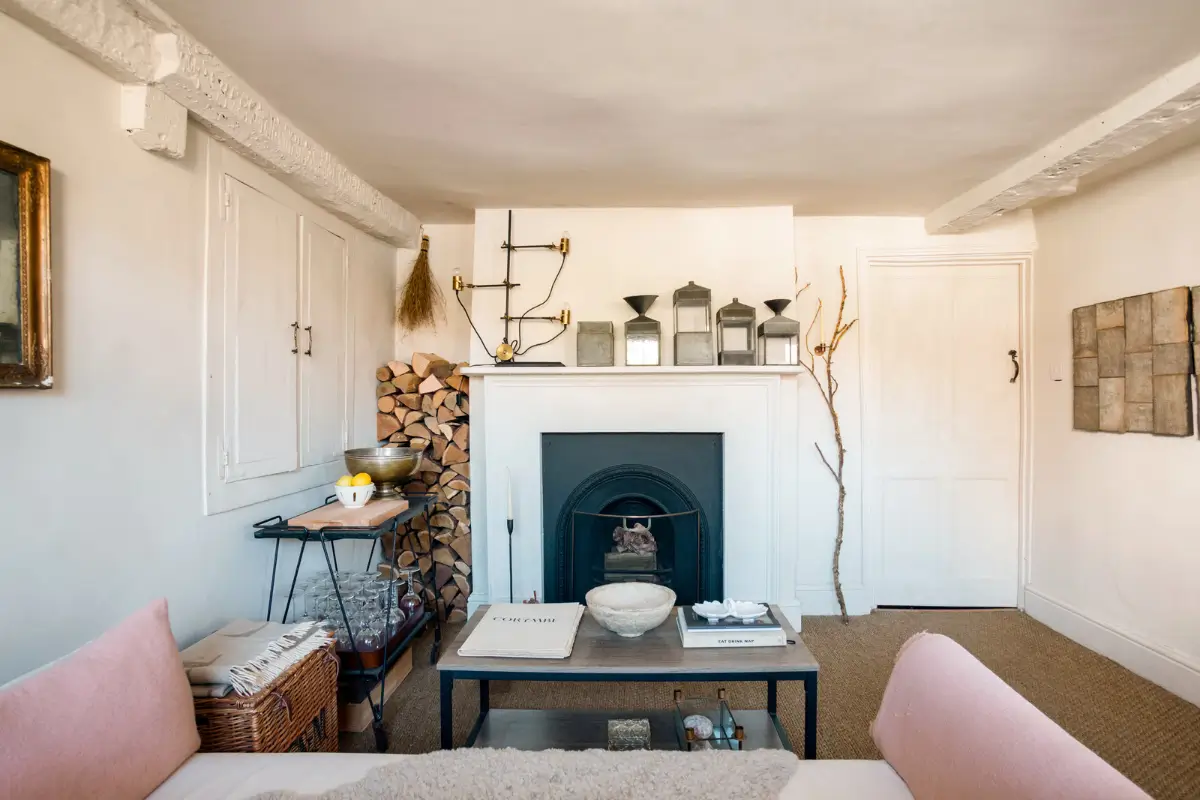 Lime Paint and Cozy Rooms in a Charming English Cottage 10 cottage living room sisal carpeting fireplace