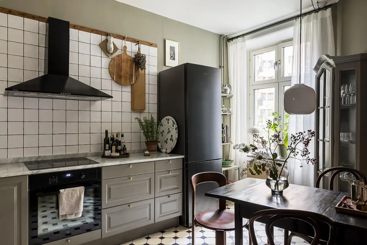 cozy gray kitchen victorian floor tiles wooden table