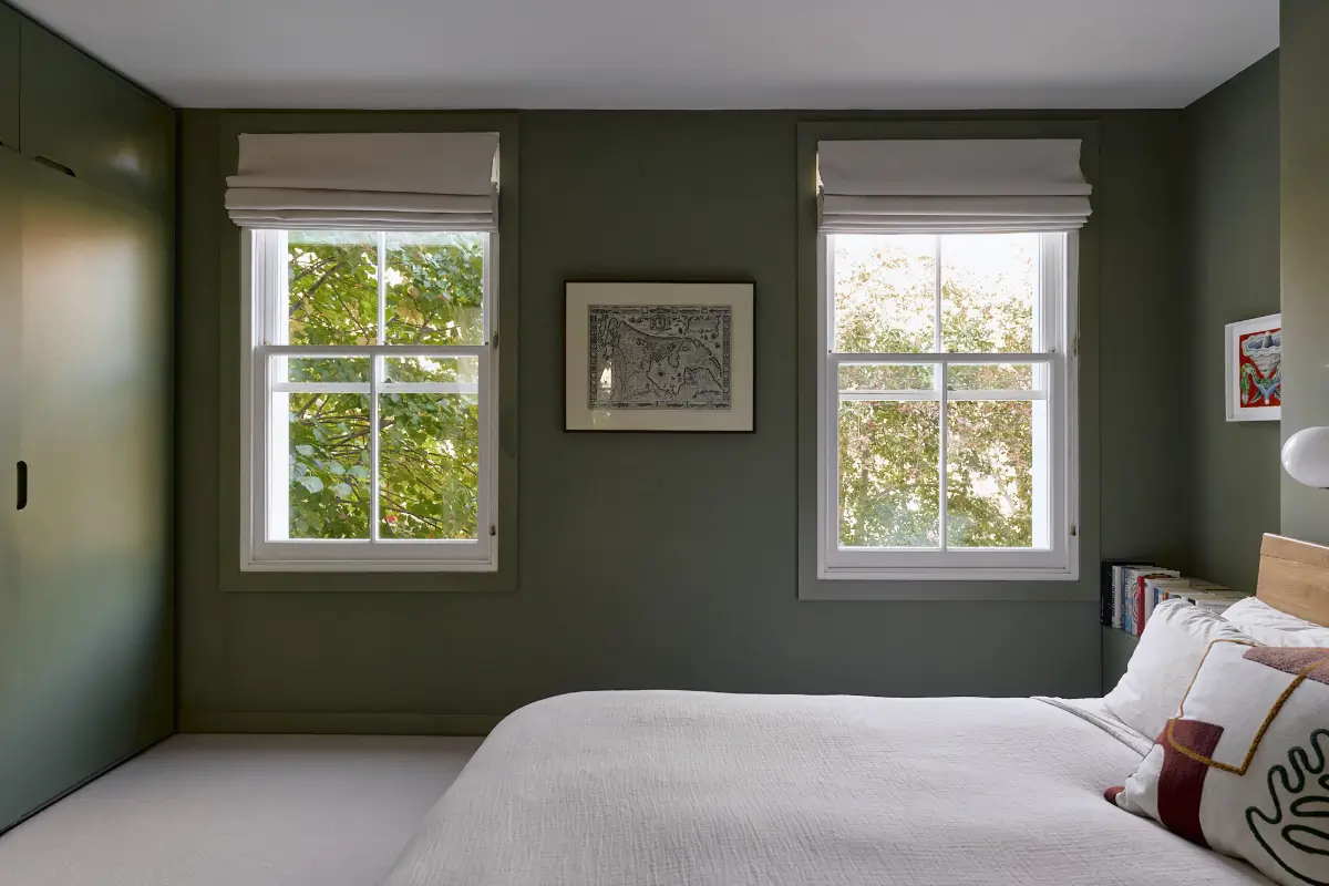 A Beautiful Victorian Townhouse Reimagined for Modern Living 30 dark green bedroom built-in wardrobes