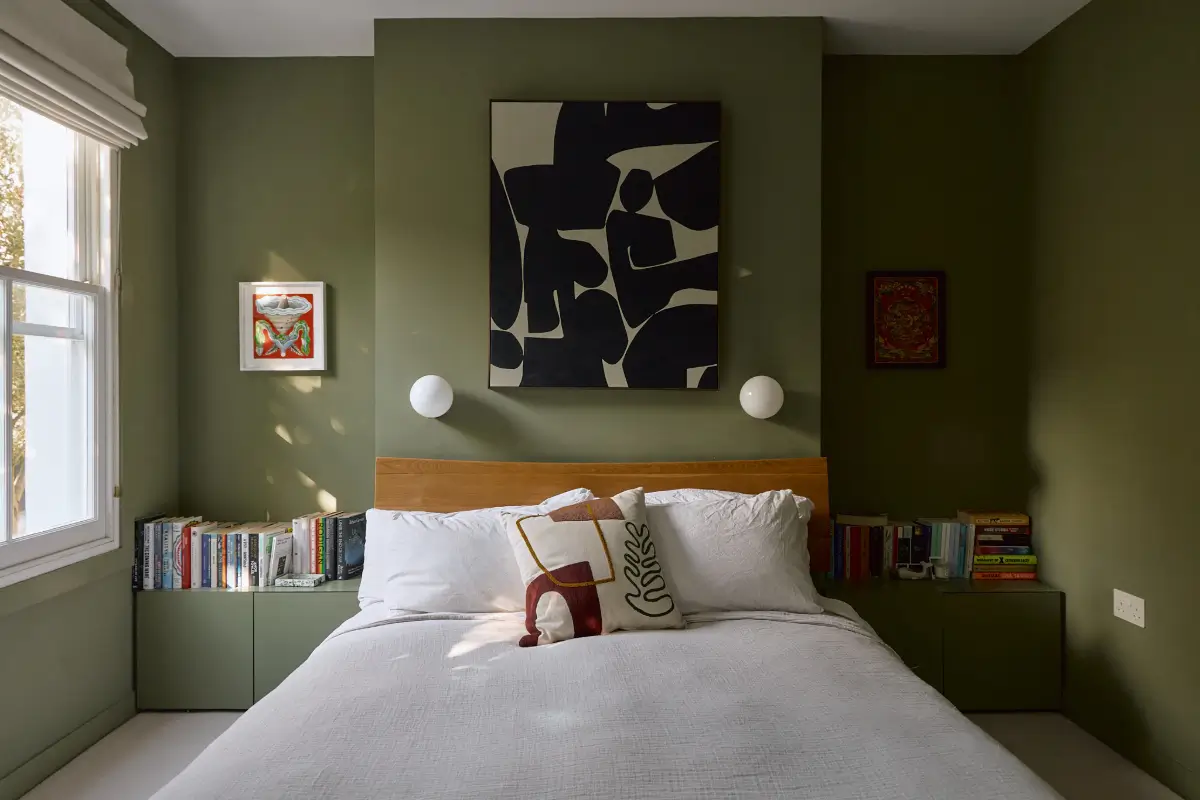 A Beautiful Victorian Townhouse Reimagined for Modern Living 29 dark green bedroom