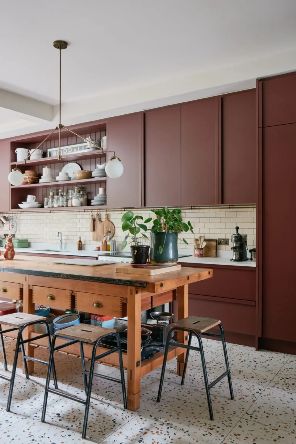 The Color Trends for 2026: A Return to Nature, Balance, and Grounding 40 deep-red-kitchen-cabinets-terrazzo-floor
