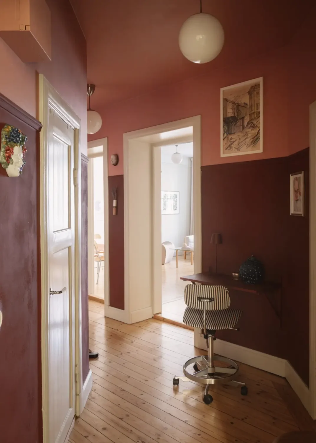 The Color Trends for 2026: A Return to Nature, Balance, and Grounding 39 deep-red-pink-hall-home-office-color-trends-2026-nordroom