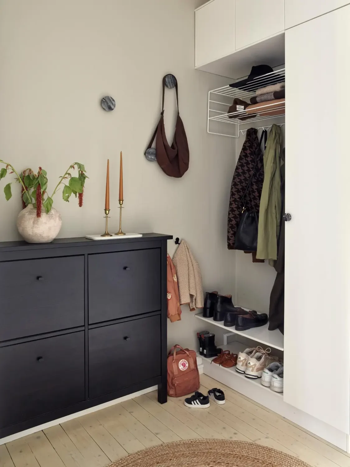Gray Tones and High Ceilings in a Cozy Swedish Duplex Apartment 35 entry hall storage
