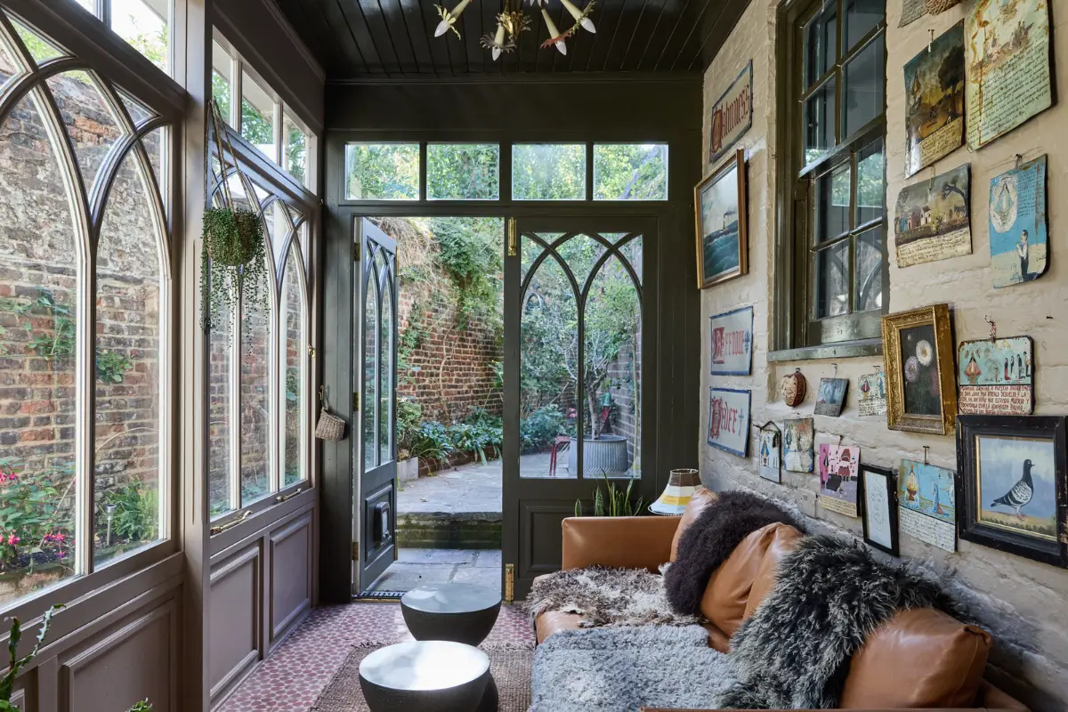 A deVOL Kitchen in a Beautiful Restored Georgian Townhouse in London 6 garden room red tiles painted brick wall