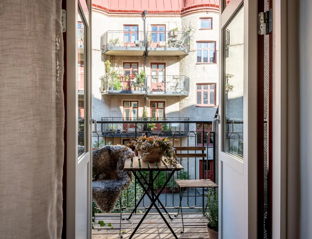 William Morris Wallpapers and Period Features in a Gothenburg Apartment 30 glass doors to balcony