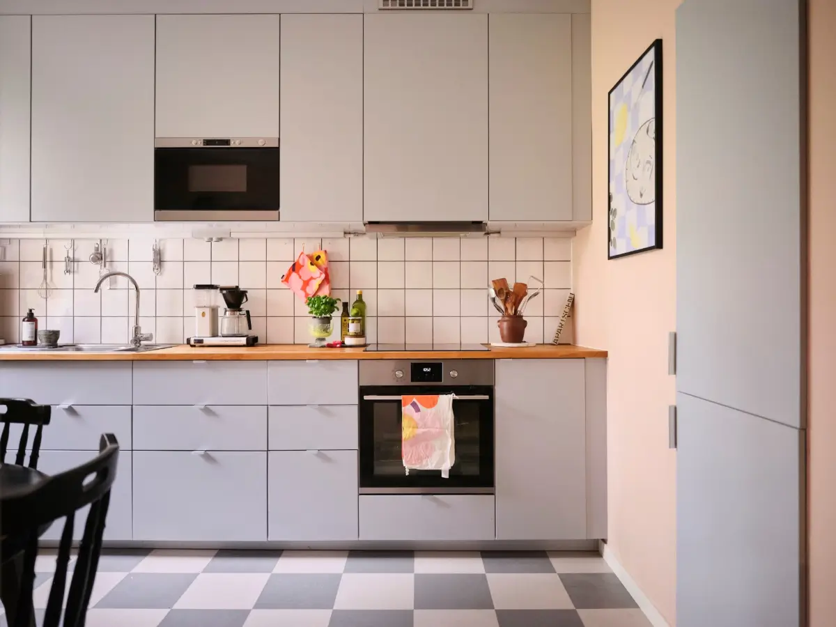 A Natural Color Palette in a Swedish 1940s Apartment 16 gray kitchen light pink walls