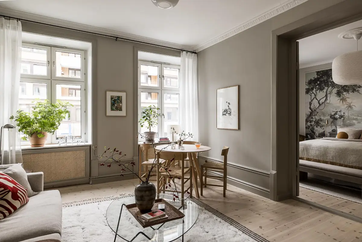 Gray Tones, Wallpapers, and a Mint Green Fireplace in a Swedish Apartment 4 gray walls living room