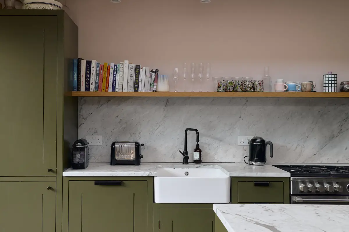 A Beautiful Victorian Townhouse Reimagined for Modern Living 14 green kitchen cabinets butler sink