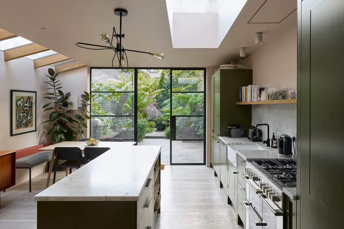 A Beautiful Victorian Townhouse Reimagined for Modern Living 12 green shaker cabinets