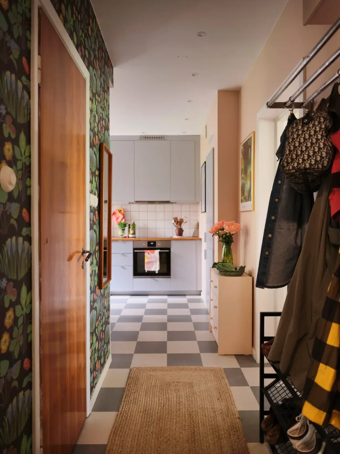 A Natural Color Palette in a Swedish 1940s Apartment 21 hall and kitchen checkerboard floor