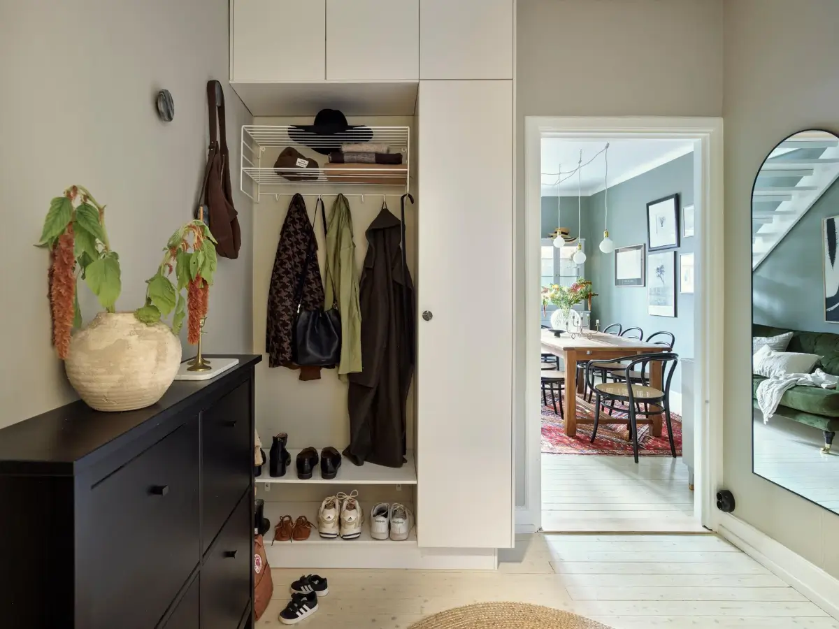 Gray Tones and High Ceilings in a Cozy Swedish Duplex Apartment 34 hall storage cabinets wooden floor