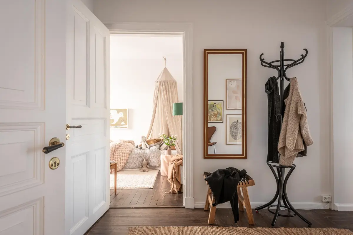 William Morris Wallpapers and Period Features in a Gothenburg Apartment 27 hall view into kids bedroom