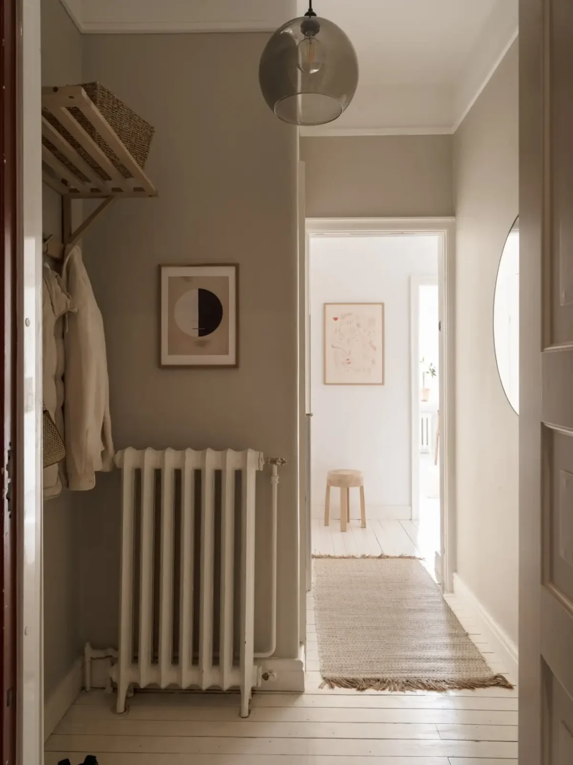 A Fresh 1920s Apartment with White Floorboards and Exposed Brick 25 hall white floorboards