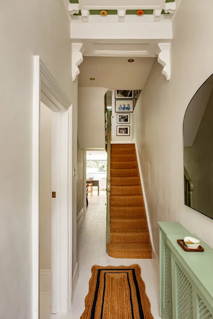 Period Elements and Subtle Color Accents in a Victorian Family Home 26 hall with staircase