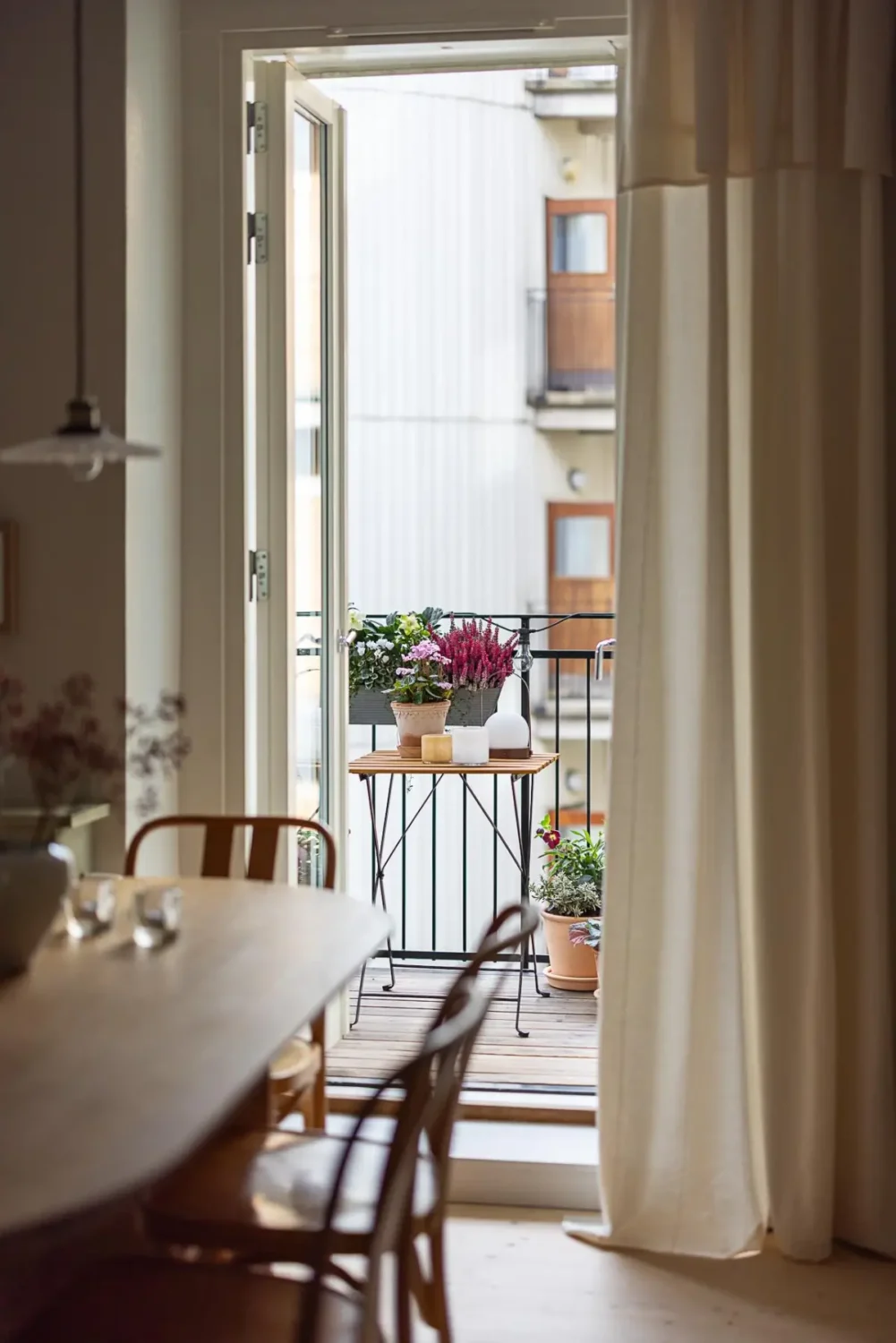 A Classic Renovated Apartment with a Social Light Green Kitchen 32 kitchen balcony