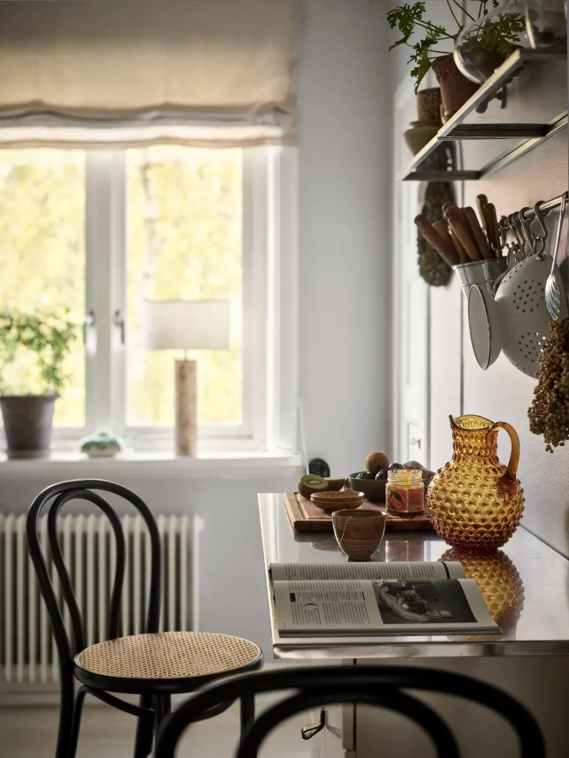 Gray Tones and High Ceilings in a Cozy Swedish Duplex Apartment 29 kitchen bar seating