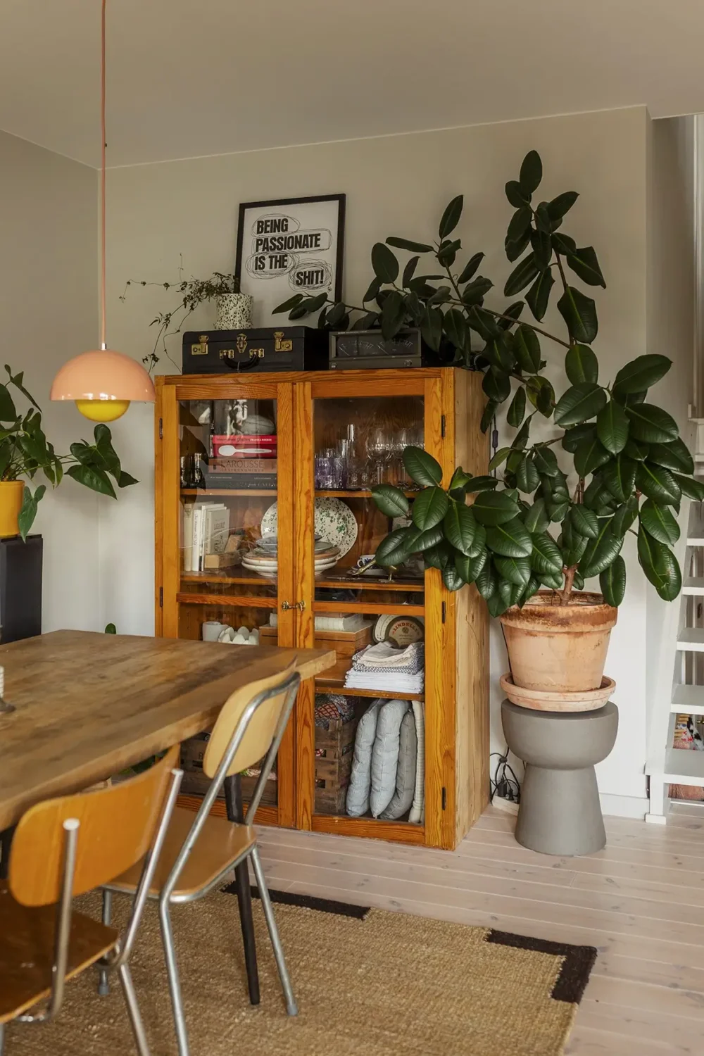 A Charming 1960s Family Home in Stockholm 3 kitchen table glass cabinet