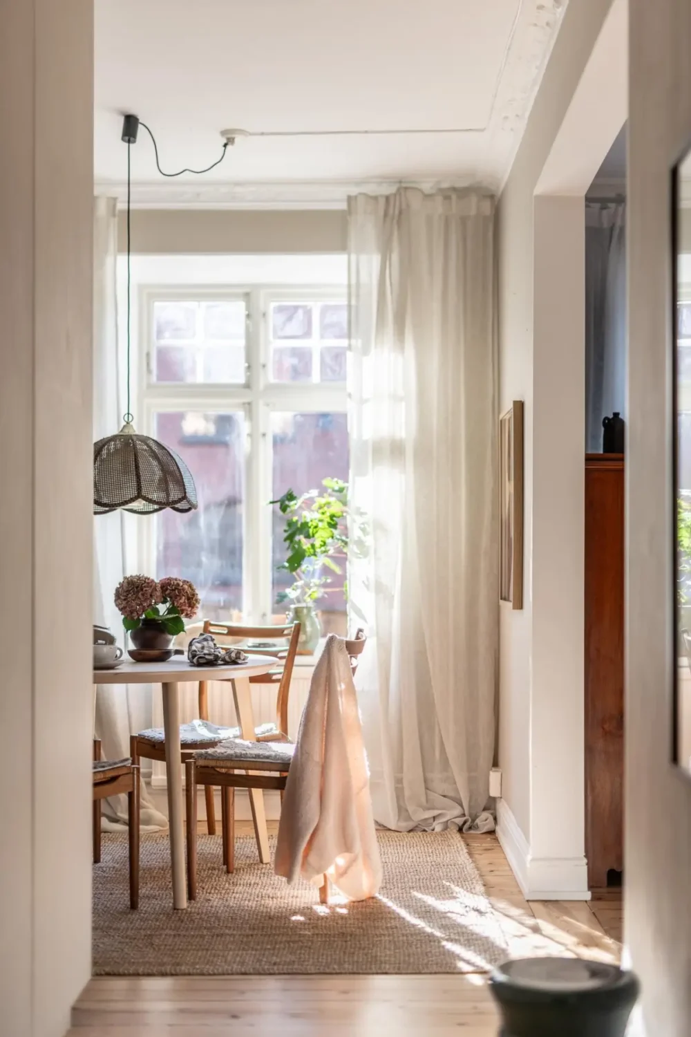 William Morris Wallpapers and Period Features in a Gothenburg Apartment 18 kitchen table large window