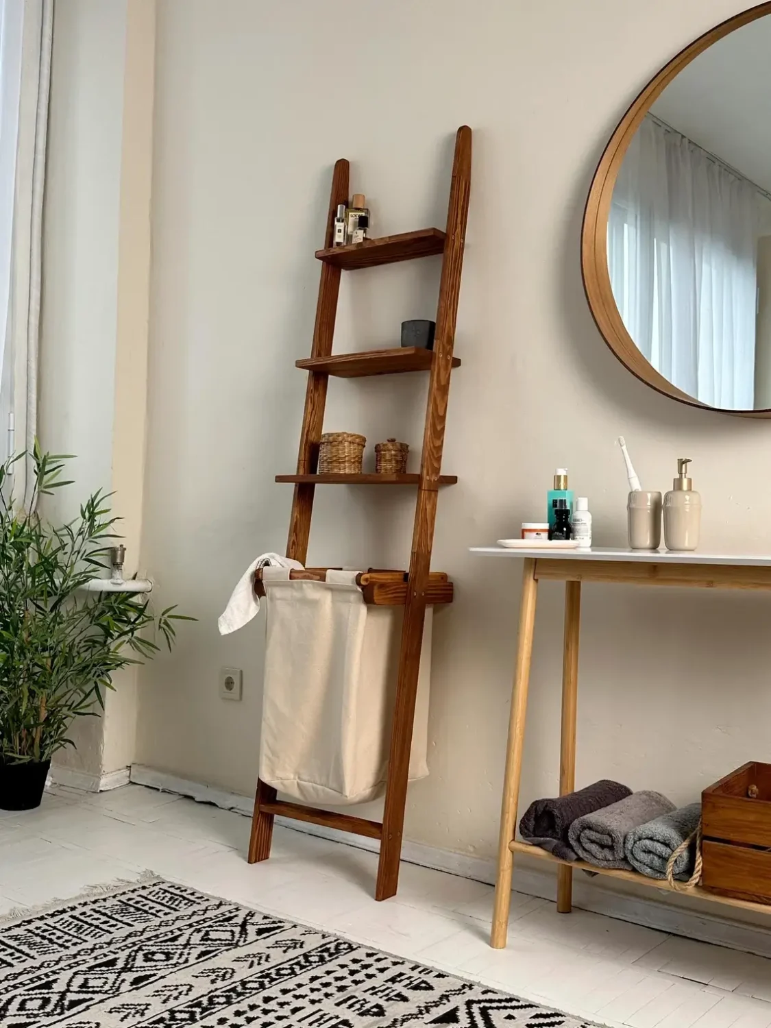 30 Smart Storage Etsy Finds to Transform Your Small Bathroom 14 ladder shelves laundry basket nordroom 30 Smart Storage Etsy Finds to Transform Your Small Bathroom