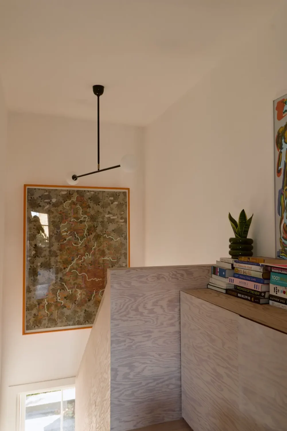 A Beautiful Victorian Townhouse Reimagined for Modern Living 38 landing with cabinets