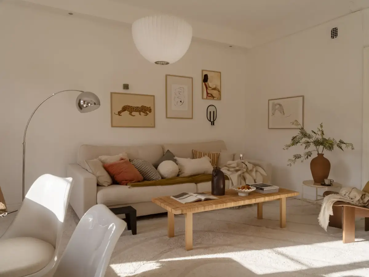 A Fresh 1920s Apartment with White Floorboards and Exposed Brick 4 light neutral tones living room