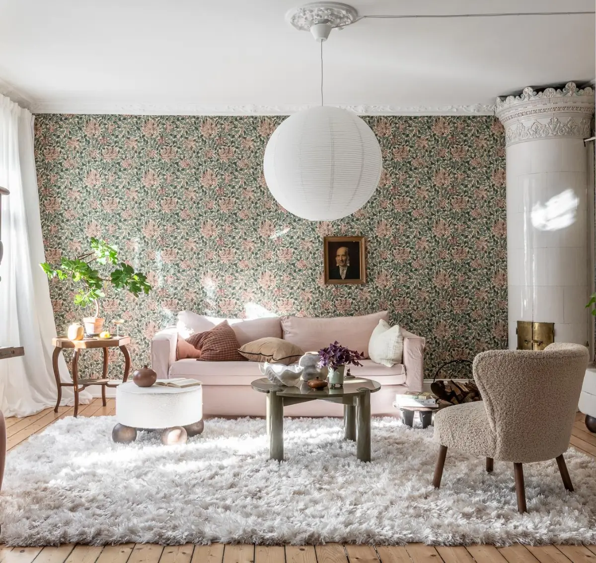 William Morris Wallpapers and Period Features in a Gothenburg Apartment 1 light pink sofa william morris wallpaper fireplace