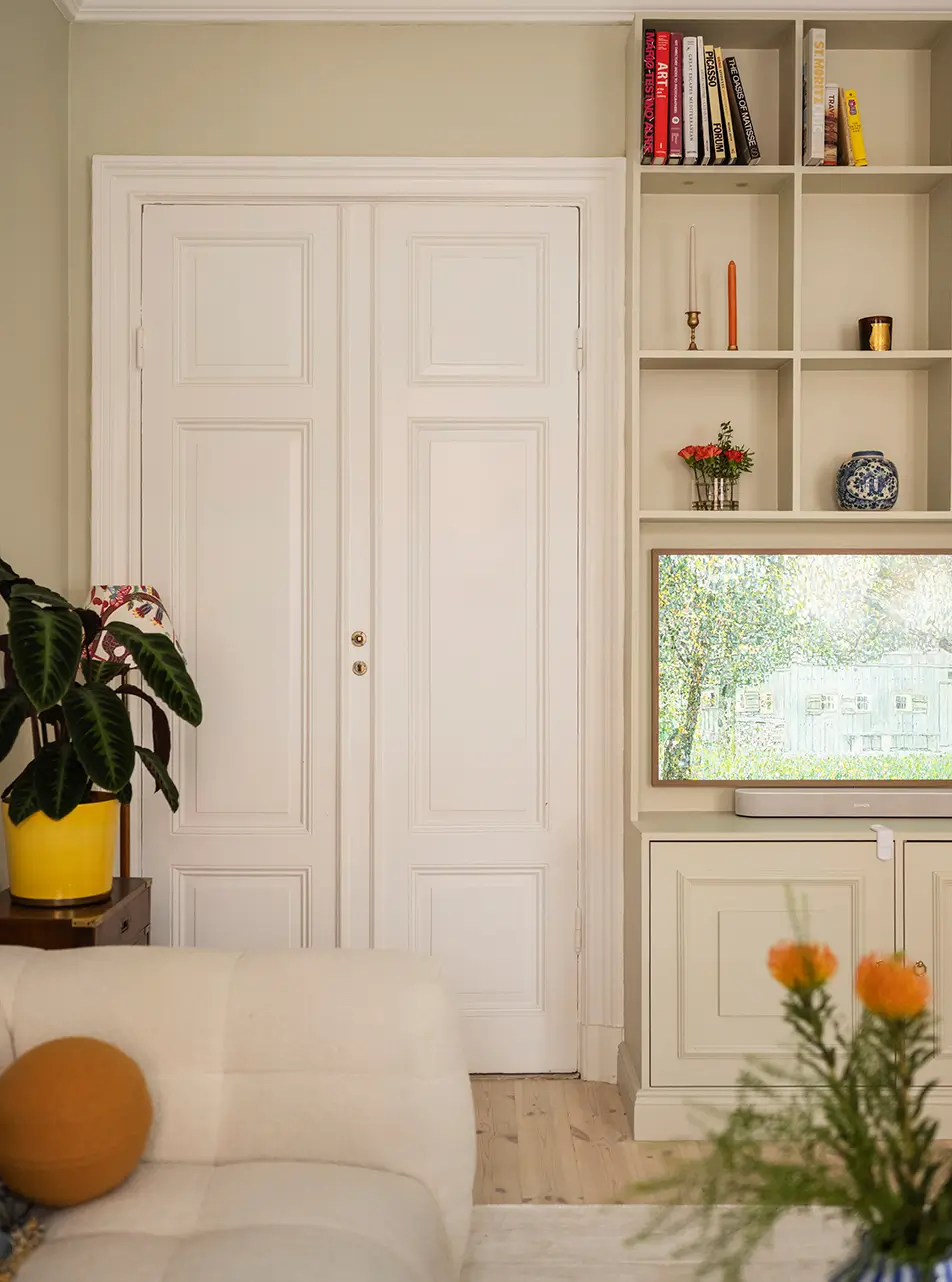 A Stylish Beige Apartment with a Light Blue Kitchen 4 living room cabinets